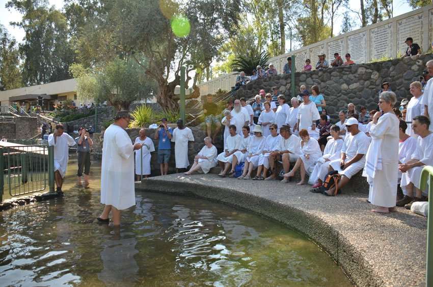 Baptisms in Israel at Yarding on a Vision Christian Tour