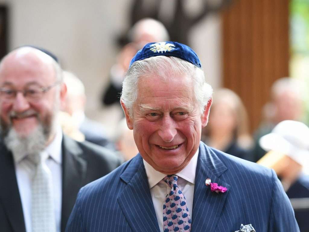 Prince Charles, speaks with chief rabbi Ephraim Mirvis
